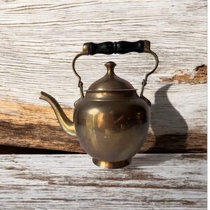 Vintage brass tea pot with wooden handle